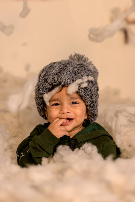 Just a little guy in a big pile of snow!